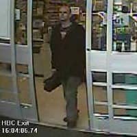 A surveillance camera recorded this man stealing the purse of an elderly woman at the Stop & Shop on Greenwich Avenue. CREDIT: Rhode Island's Most Wanted
