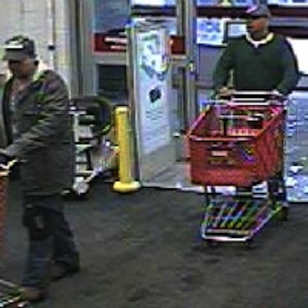 Surveillance cameras caught these two men running out of Lowe's with two shopping carts of stolen merchandise on April 23. CREDIT: Rhode Island's Most Wanted