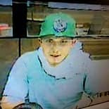 Surveillance footage used to identify Jared Seigel, 21, in a June 25 bank robbery. CREDIT: Rhode Island Most Wanted website