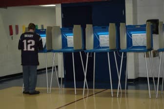 A voter makes his choices during the 2014 primary. 