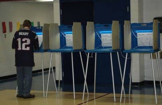 A voter makes his choices during the 2014 primary.