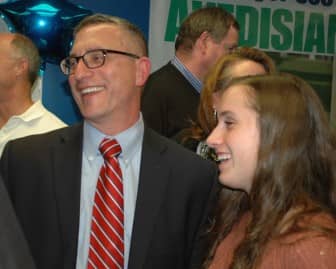 Councilman Steven Colantuono with his daughter, Sophie, 14, at Mayor Scott Avedisian's campaign HQ during the 2014 Election Nov. 4.