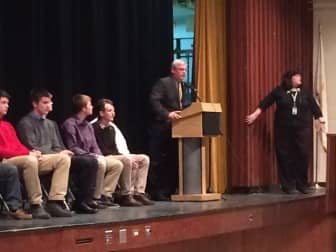 Mayor Scott Avedesian and Pilgrim High Principal Marie Cote congratulate the Pilgrim High Boys Varsity Basketball team on their championship win  Wednesday. 