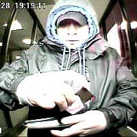 The suspect in a Warwick ATM skimming case, identified by police as Moises Morales Cano, is shown in a surveillance photo from Feb. 27.