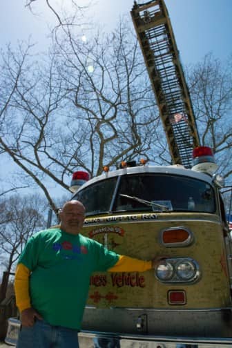 Ray, a volunteer fireman at the Cross Mills Fire Station in Charlestown, R.I. and a cancer survivor, with the Colors for A Cause Cancer Awareness Vehicle "Ray" Brennan's Gift to Ray.