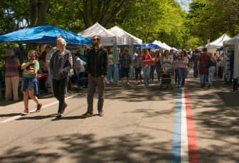Crowds walk Narragansett Parkway during the the Gaspee Days Arts and Crafts Festival this weekend.