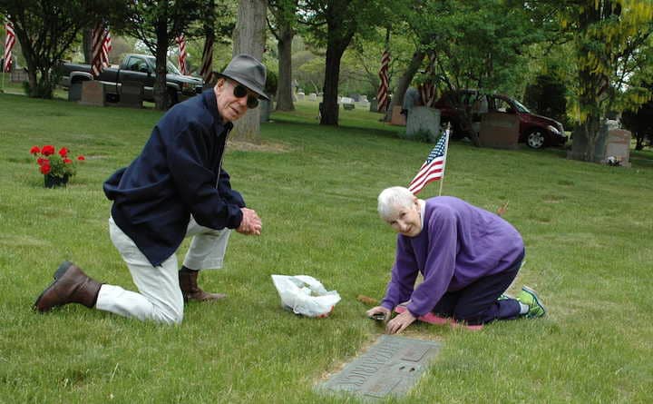 Charles and Ellen Fitzpatrick tend to their own cemetery plots Memorial Day at Pawtuxet Memorial Park . "I belong right here," Ethel said.