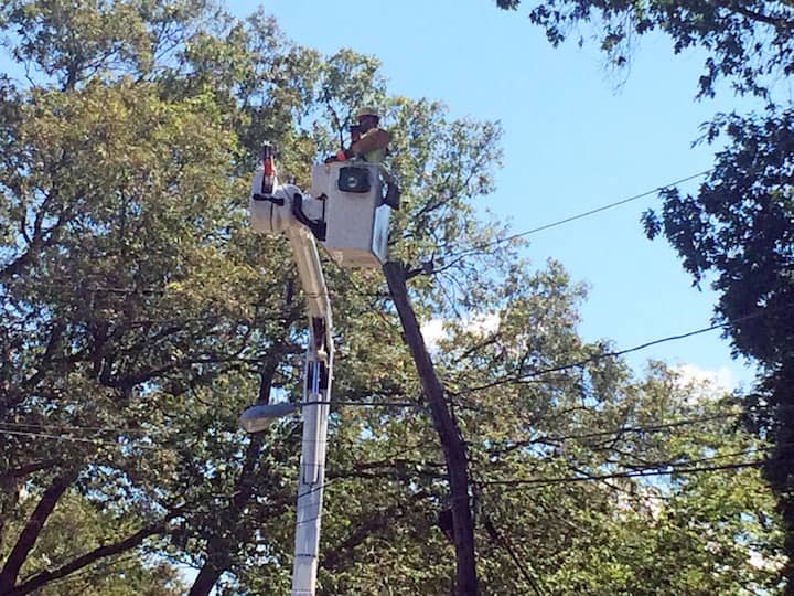 A line crewman works to restore power on Namquid Drive in Warwick Wednesday afternoon.