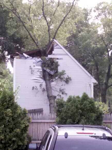 A tree knocked into a home in Warwick during this morning's powerful storm. Officials warn more severe weather is on the way.