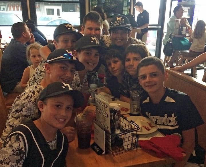 From left, Benji Moorby, Jared Reminder, Kenny Rix, Sean Gallagher, Timothy Machamer, Domenic Brazeau, Dylan Gallagher, Christian Brown and Brendan Rooney at Dave's Bar and Grill,  where patrons packed the house to watch the Warick Girls North in the Little League Softball World Series Aug. 18.
