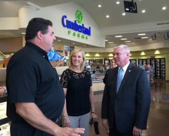 From left, John Wilbur, area sales manager for Cumberland Farms, Warwick Tourism Director Karen Jedson, and Mayor Scott Avedisian talk about Cumberland Farms' new Apponaug Four Corners location.