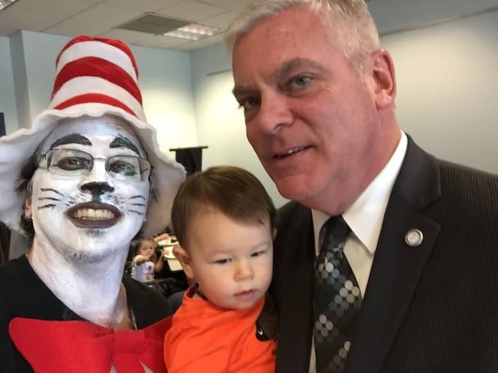 Mayor Scott Avedisian and a young library fan get their photo with The Cat in the Hat during Warwick Public Library's 50th Anniversary.