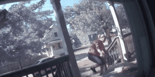 A still shot from a video of a woman stealing a mail package on Manolla Avenue on Labor Day. Police are asking the public's help in identifying the woman and her accomplice.