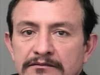 A federal arrest warrant has been issued for Carlos Cisneros, 53, of Jackson Heights, NY, who is charged with skimming from ATMs in RI and CT.