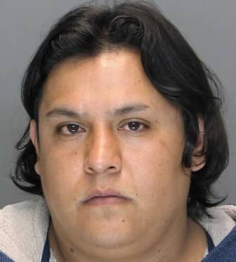Moises Morales Canos is charged with skimming from ATMs in RI and CT.