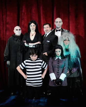 Alexander LeBlanc as Pugsley, Kayla Tomas as Wednesday, Connie Anderson as Grandma, (back row from left) Fred Frabotta as Uncle Fester, Katie Anne Clark as Morticia, Steve Gagliastro as Gomez and Joseph Torello as Lurch star in the magnificently macabre musical comedy, The Addams Family, being presented at Ocean State Theatre in Warwick through Oct. 25. 