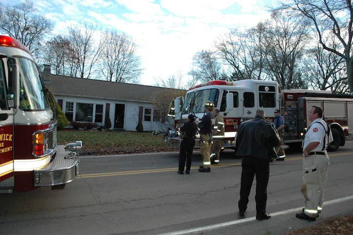 [CREDIT: Rob Borkowski]Police and firefighters outside 220 Diamond Hill Road shortly after Warwick Firefighters put out a living room fire in the home. Battalion Chief David Morse is pictured at right.