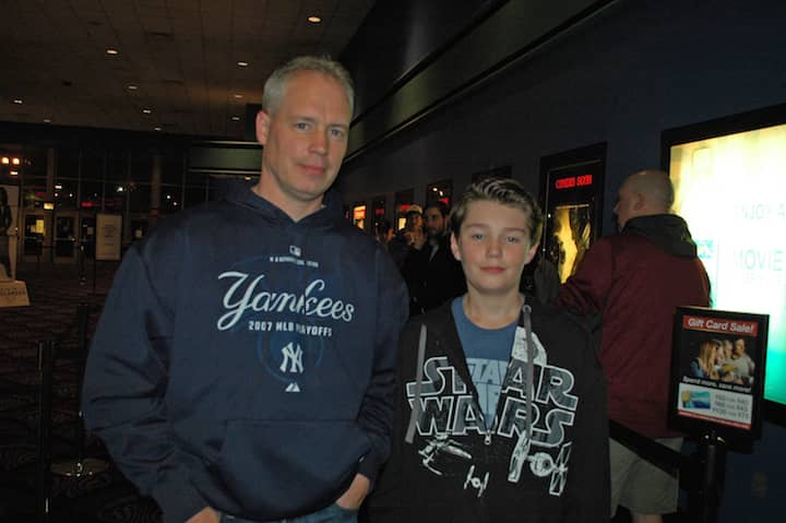 [CREDIT: Rob Borkowski] Scott Hackett and Matt Hackett, 13, waiting for one of the first showings of The Force Awakens Dec. 17 at Showcase Cinemas.