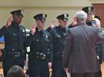 Officers Tim "TJ" Tavares, Mitch Voyer, Chris Cote and Walter Larson are sworn in by Mayor Scott Avedisian to Third Class Patrolmen, having completed their probationary period.