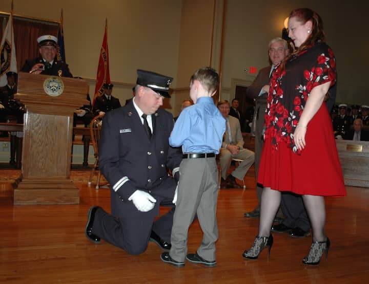 [CREDIT: Rob Borkowski]Captain Keith Brown is pinned by his wife, Sarah and son, Kevin.