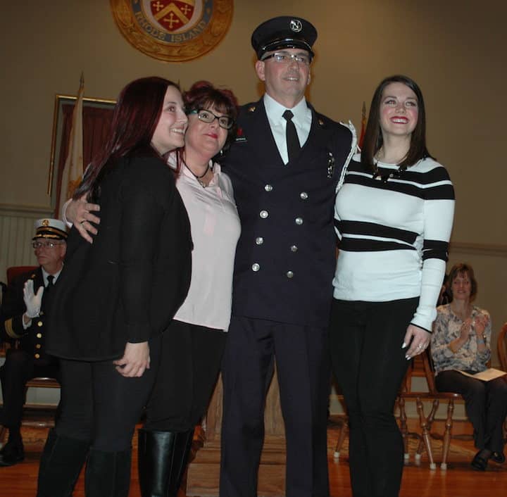 [CREDIT: Rob Borkowski] [CREDIT: Rob Borkowski] Newly sworn-in Captain Marcel Fontineau Jr. with his wife, Barbara and their daughters, Amanda and Essie.
