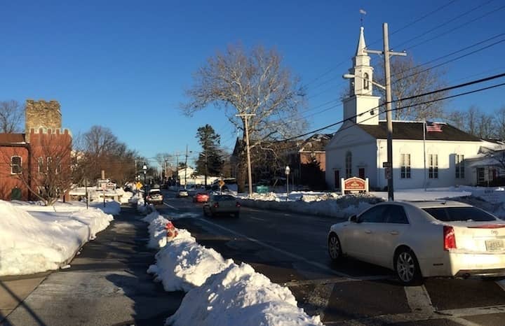[CREDIT: Rob Borkowski] A view down Post Road in Apponaug from Jan. 28, 2015. While businesses and homeowners are required to clear sidewalks, the latest changes to Warwick's shoveling ordinance could result in confusion. There's no doubt about good neighbors' responsibility regardless of the law, however.