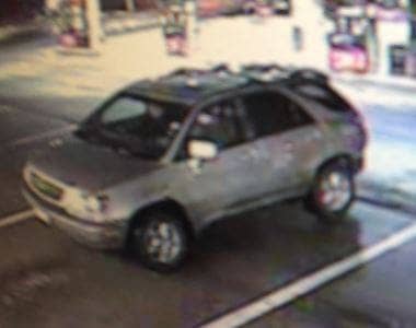 [CREDIT:WPD] Police are asking the public's help locating two men seen on camera using a stolen credit card Feb.1 in Warwick. They were last seen transported in this vehicle by a third person, police report.