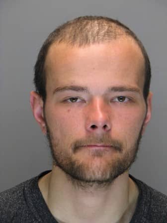 [CREDIT: WPD] Warwick Police arrested Michael Collins, 26, Wednesday morning after finding him inside a house he broke into on Bokar Street. Police say he broke into two homes in the area seeking food and shelter. 