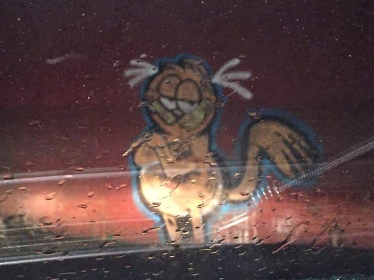 [CREDIT: WPD] A grafitti image of Garfield in Conimicut shared on the WPD facebook page Feb. 1. The Conimicut Neighborhood Association has listed a $500 reward for info leading to the arrest of the artist responsible for a number of graffiti works appearing throughout the village in February.