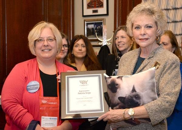 [CREDIT: RI State House] Rep. Patricia A. Serpa, right, receives the 2015 Humane Legislator Award from Joanne Bourbeau, New England Regional Director of the Humane Society of the United States, during a ceremony in the office of the Speaker of the House.