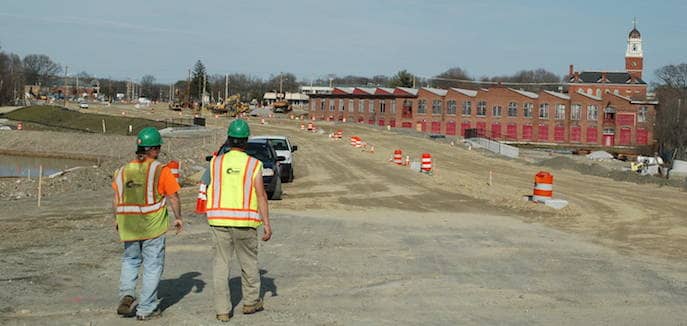 [CREDIT: Rob Borkowski] A view of construction on the mill site in Apponaug, looking toward Veterans Memorial Drive along a new road being built between the Toll Gate Road and Centerville Road intersection and the Greenwich Avenue/Veterans Memorial Drive intersection.