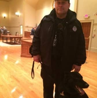 Ptlm. Paul Wells and his partner, K9 Fox, at City Hall prior to the April 7, 2015 ‪‎Warwick‬ City Council meeting. The meeting was a continuation of that Monday’s meeting, which a bomb threat ended prematurely.