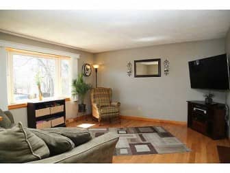 [CREDIT: Statewide MLS] The living room of 136 Green River Ave. 