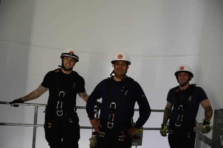 [CREDIT: Rob Borkowski] From left, Rescue Lieutenant Brad Ginaitt, Lieutenant Bill Wilson and Firefighter Nate Pacheco inside the NK wind turbine, about 20 feet up on the first platform.