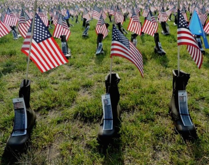 [CREDIT: Lincoln Smith] The Boots on the Ground exhibit honoring the men and women who have died in service since Sept. 11, 2001.