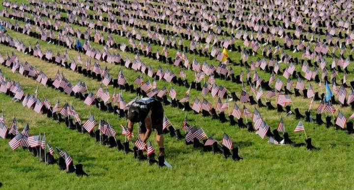 [CREDIT: Lincoln Smith] The Boots on the Ground exhibit honoring the men and women who have died in service since Sept. 11, 2001.