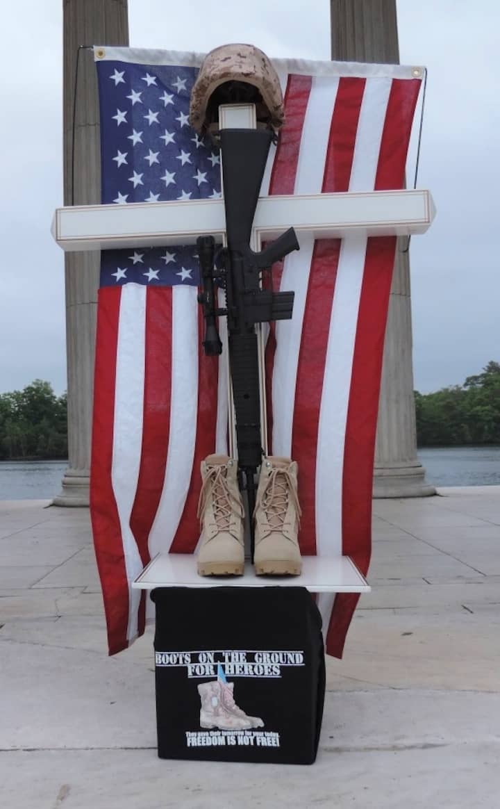 [CREDIT: Lincoln Smith] The Boots on the Ground exhibit honoring the men and women who have died in service since Sept. 11, 2001.