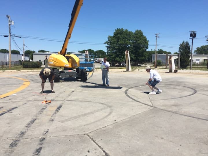 [CREDIT: Rob Borkowski] Robert Corio, Norman Cook and Roger Peck measure the pylon bases for the Airport Road Dome on Saturday.