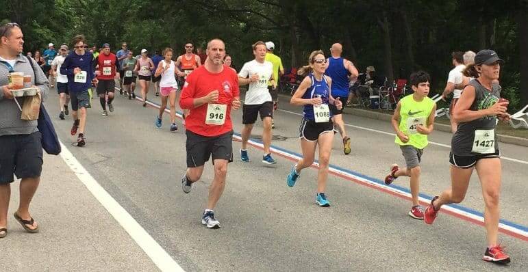 [CREDIT: Beth Hurd] From left, Jason Bouchard, 44, of Coventry (25:56.3), Scott Bonnell, 40, of NYC (24:23.2), Linda Lewis, 48, of Seekonk, MA, (25:53.2), Shane Santos, 11, of Smithfield (25:42.5) and Mary Asay, 44, of Warwick (25:51.3) run in the 2016 GaspeeDays5K June 11. 