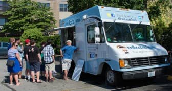 [CREDIT: Mary Carlos] The Mike's Ice truck boasted the longest line at the Ice Cream Throwdown in Providence.