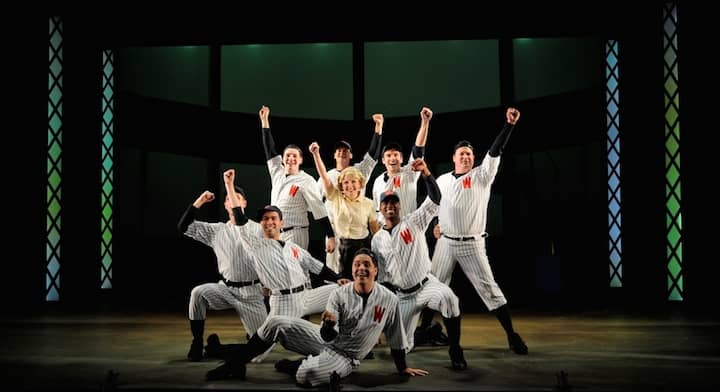 [CREDIT: Mark Turek] Kristen Arsenault as Gloria and the ball players perform “Shoeless Joe From Hannibal, Mo” in the Tony® Award-winning musical comedy, Damn Yankees,
