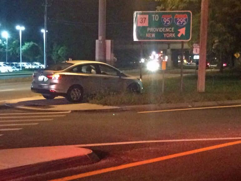 [CREDIT: Rob Borkowski} State and local police, as well as the WFD aided a motorist who jumped the curb at the Rte. 37 ramp near Gregg's Restaurants. 