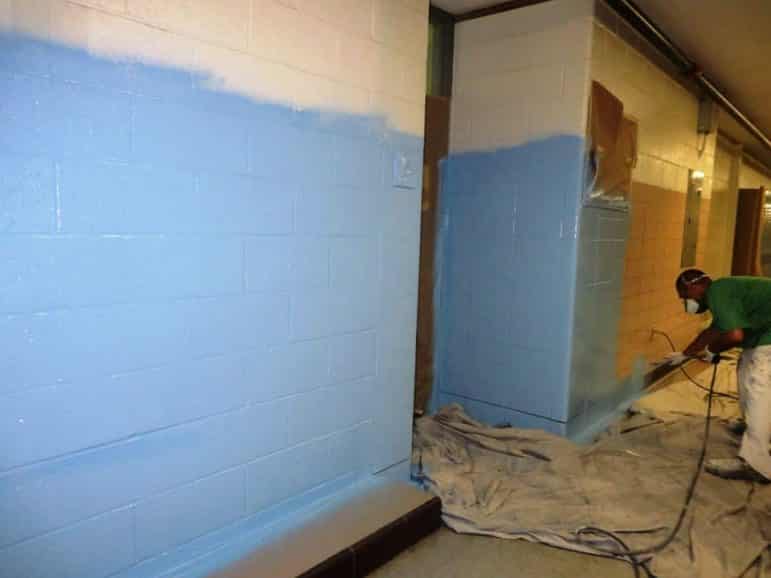 [CREDIT: Mayor Avedisian's Office] Painters were busy brightening up the interior of Warwick Veterans Middle School with new paint Aug. 2.