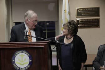 [CREDIT: RIAG] Former Attorney General Dennis Roberts presents Representative Eileen Naughton (Warwick) with the Attorney General Patrick Lynch Justice Award for Senior Protection for being a champion of the elderly and disabled. 