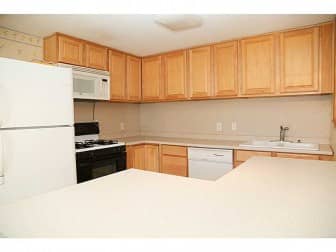 [CREDIT: Statewide MLS] The kitchen at 65 Keeley Ave.