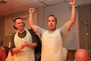 [CREDIT: Gel's Kitchen] Mike Penta of Warwick,, part owner of Gel's Kitchen, celebrates his pie eating contest win Saturday.