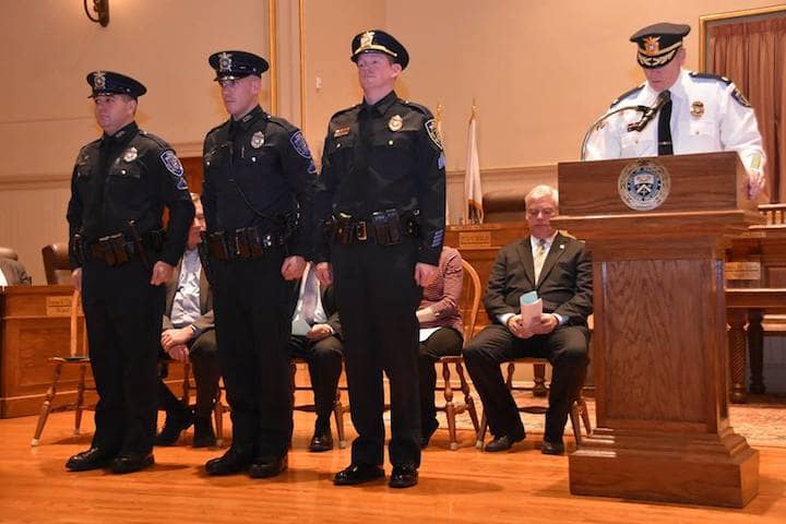 [CREDIT: WPD] Lifesaving award to Officer Matthew Higgins, Officer Christopher Lo, Sergeant Joshua Myer; not pictured Officer Jason Cooke at Warwick City Hall.