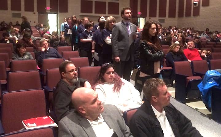 [CREDIT: Rob Borkowski] A long line of public commenters begins to form at the April 4 School Committee meeting. Among the speakers was Warwick City Councilman Jeremy Rix. Seated at left is WFD Chief James Daugherty.