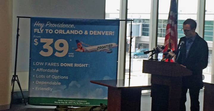 [CREDIT: Rob Borkowski] Daniel Shurz, Sr. VP Commercial, Frontier Airlines, announces the $39 introductory rate for flights to Orlando and Denver at TF Green Wednesday.