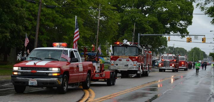 [CREDIT: Rob Borkowski] Fire trucks line down West Shore Road in the 2017 Memorial Day parade.